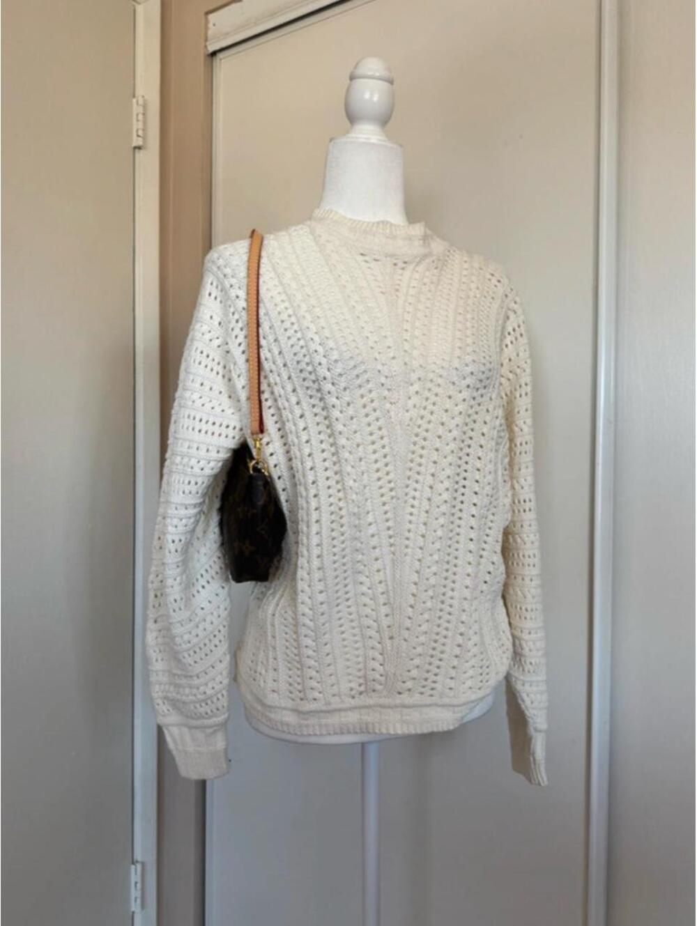 Cream cable knit sweater with lace-like openwork pattern, size L